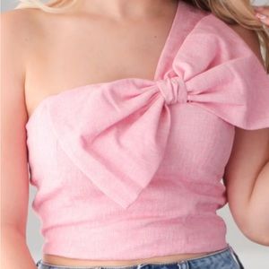 This beautiful pink bow crop top never been used good condition